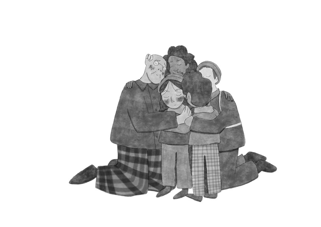 Melva and her friends and family in a moving group hug